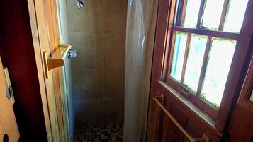 Shower, towels, toilet paper