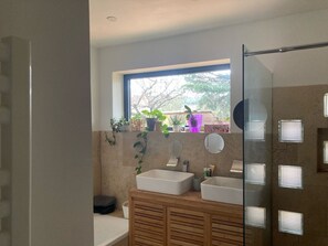 Shower, hair dryer, towels, soap