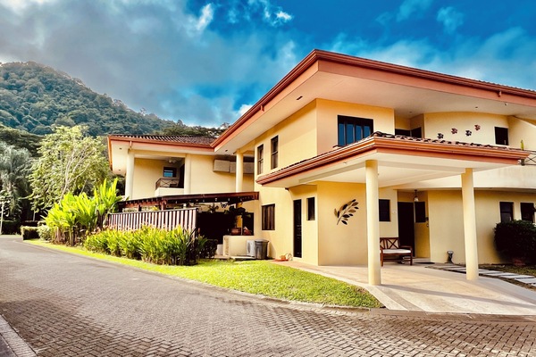 Villa Punta Leona - Front of villa. Covered parking. Room for 3 cars to park.