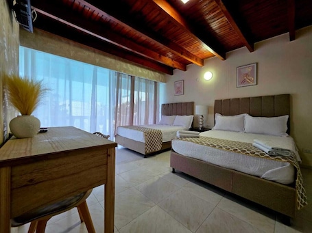 Quadruple Room, Pool View | In-room safe, free WiFi