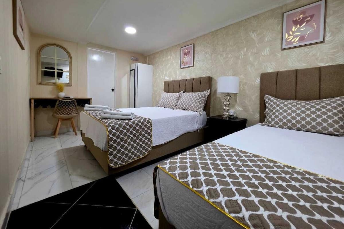Triple Room, Pool View | In-room safe, free WiFi