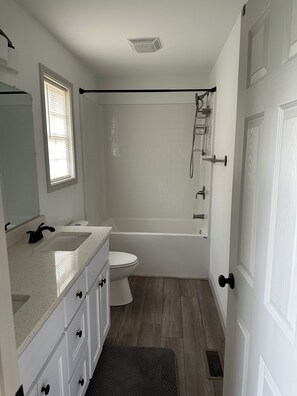 Hair dryer, towels, soap, toilet paper