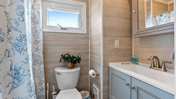 Hair dryer, towels, soap, shampoo