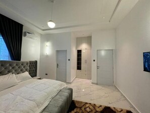 Deluxe Apartment, Balcony, City View | 1 bedroom, desk, laptop workspace, blackout curtains - Zorah's Apartment (Abuja)