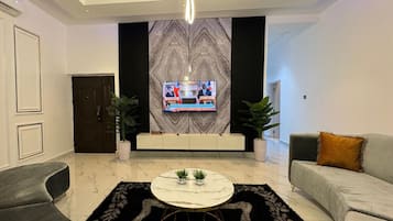 Deluxe Apartment, Balcony, City View | Living area