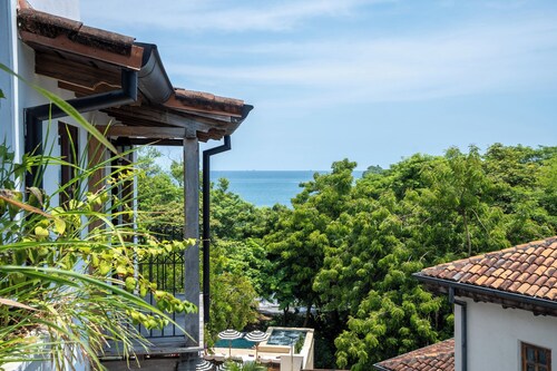 Trendy Condo with Modern Decor, Stunning Ocean Views, and Exclusive Beach Club Access