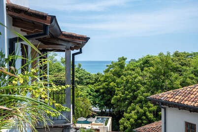 Trendy Condo with Modern Decor, Stunning Ocean Views, and Exclusive Beach Club Access