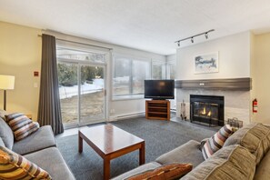 TV, fireplace - Village at Your Doorstep – Ground Floor Condo - 103 Cachet Crossing (The Blue Mountains)