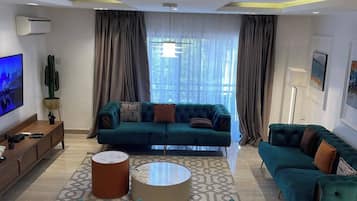 Economy-Apartment, Balkon, Stadtblick | Wohnbereich