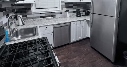 A big "Tiny" home, with large enclosed yard, next to train in downtown Westmont.