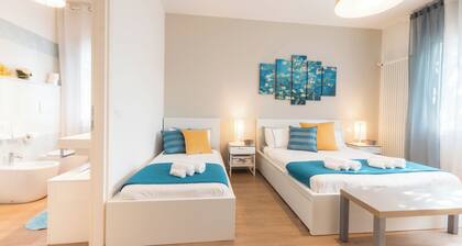 VILLA DUE GIARDINI Appartamento tre camere da letto ciascuna con bagno privato