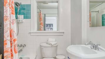 Shower, hair dryer, towels