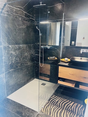 Shower, hair dryer, towels, soap