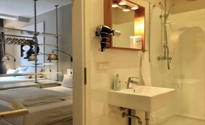 Hair dryer, towels, soap, toilet paper