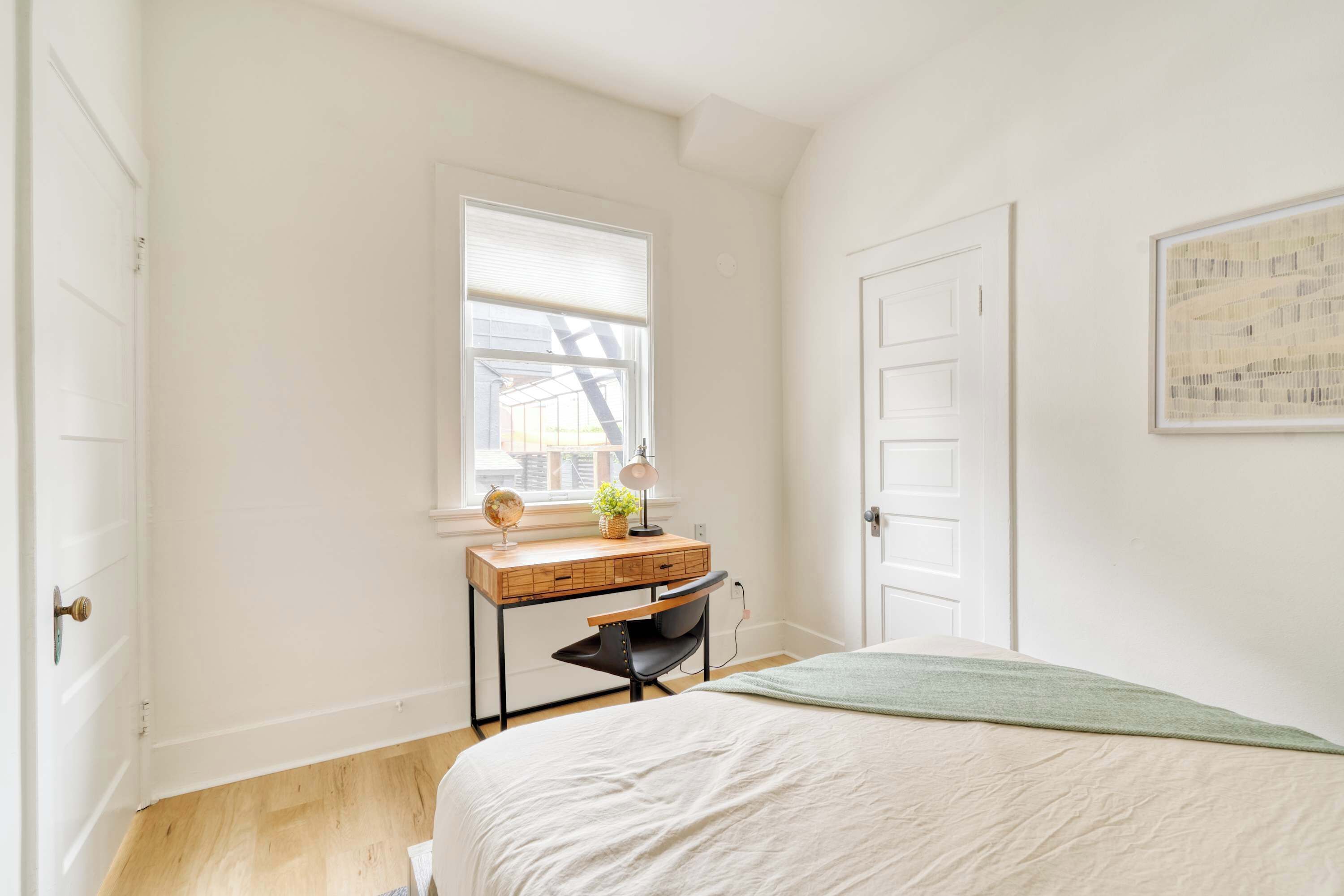 1 bedroom, desk, iron/ironing board, travel crib