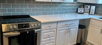 Cozy Oasis – Stylish, Spacious 4-Bedroom with Private Parking Lot