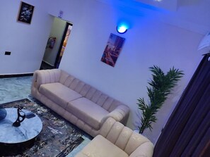 Deluxe Apartment, Balcony, City View | Living area