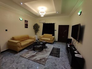 Deluxe Apartment, Balcony, City View | Living area