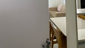 A room with a door labeled "602" and a window.