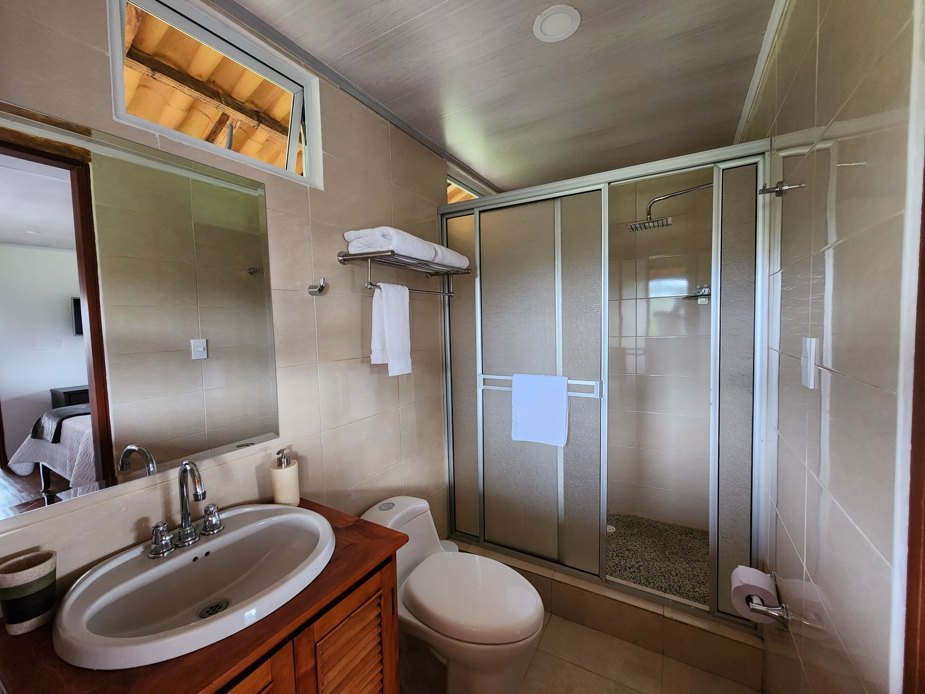 Shower, hair dryer, towels, soap