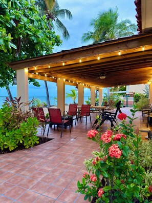 Outdoor dining - Beachfront duplex! Walk to town! Solar power/fast wifi! Rent one side or both! (Stella)
