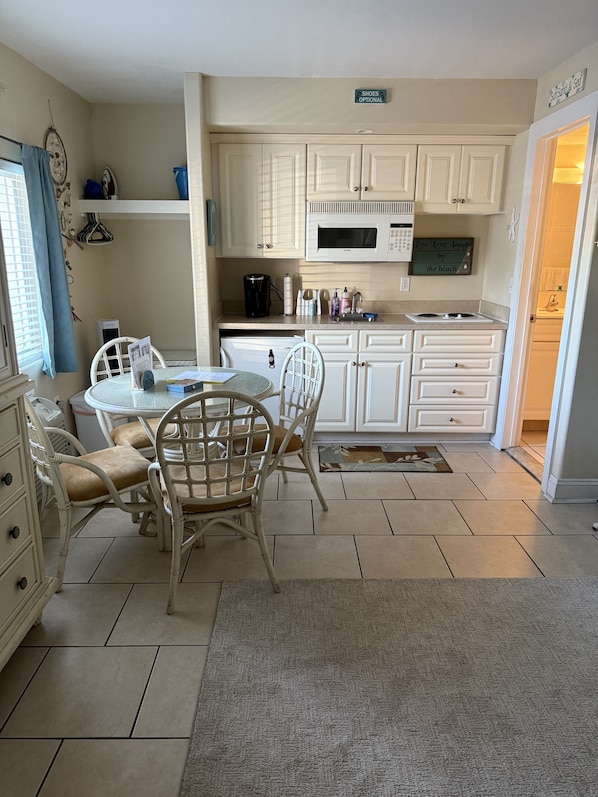 Fridge, microwave, stovetop, coffee/tea maker