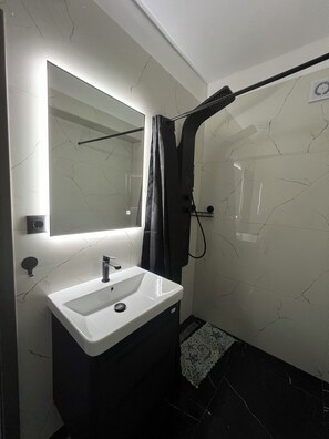 Hair dryer, towels, soap, toilet paper