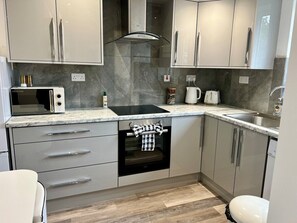 Fridge, microwave, oven, stovetop - 2 Bed Preston City Centre Flat With 1 Car Parking Space (Lancashire)