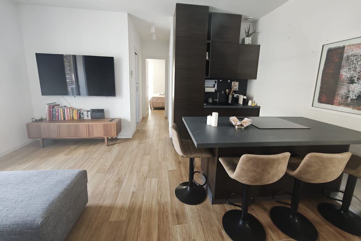 Suite familiare, balcone, vista città (Suite Tao) | Oleskelualue | Älytelevisio, Netflix, suoratoistopalvelut