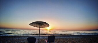 Luxury  Triple Apartment with Yard in front of the sea at Kalo Nero Kyparissia