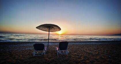 Luxury Triple Apartment with Yard in front of the sea at Kalo Nero Kyparissia