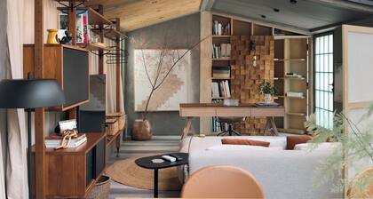 Welcome to our cozy glass studio nestled in a serene villa garden in Casablanca.