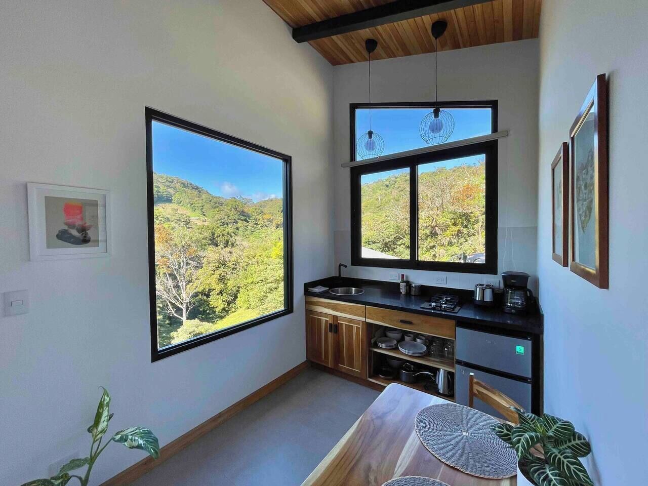 Fridge, coffee/tea maker, toaster, cookware/dishes/utensils