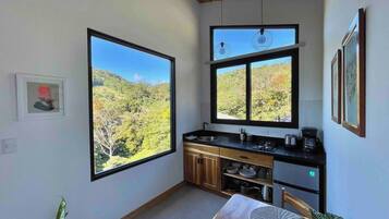 Fridge, coffee/tea maker, toaster, cookware/dishes/utensils