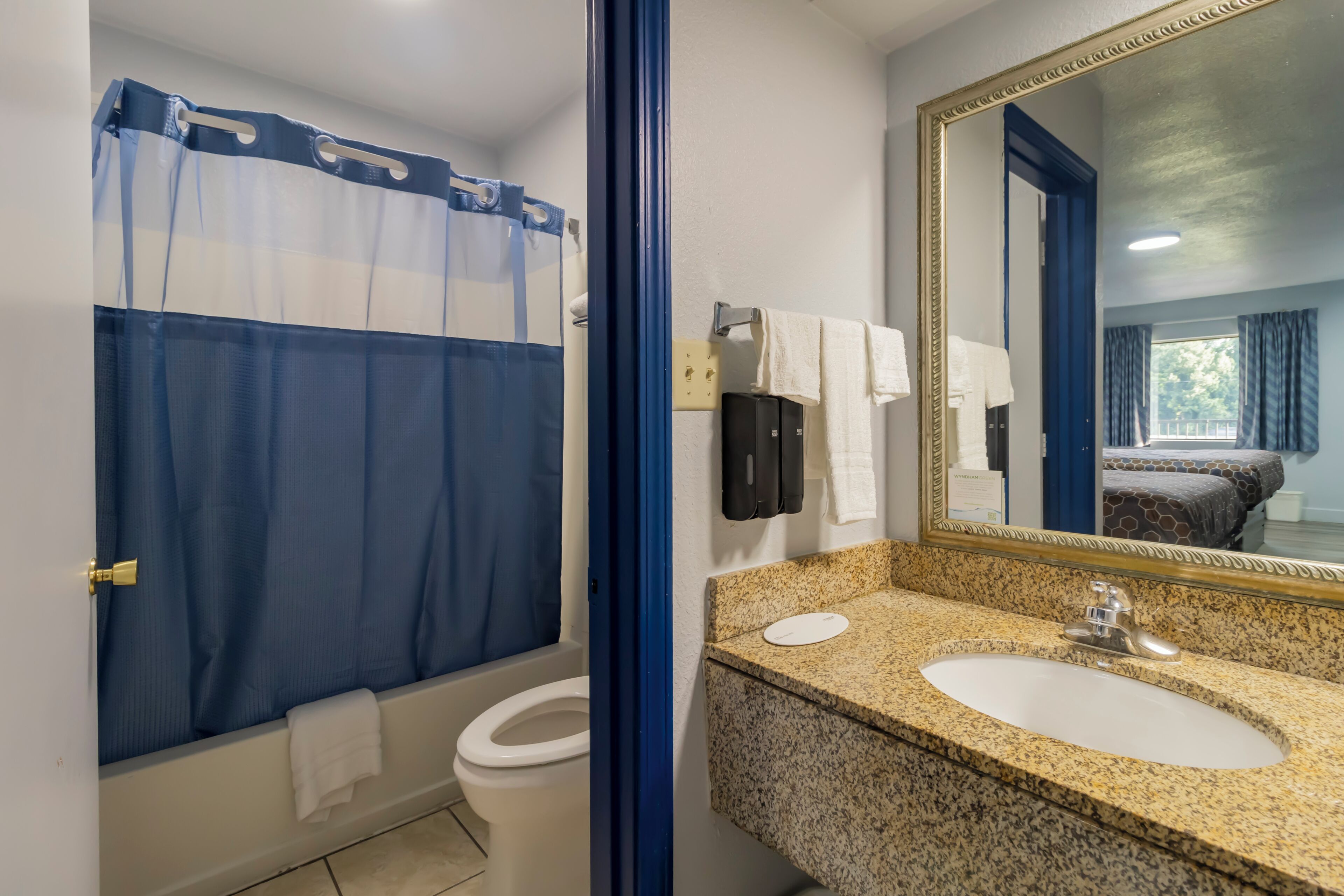 Room, 2 Queen Beds | Bathroom | Towels, soap, shampoo, toilet paper