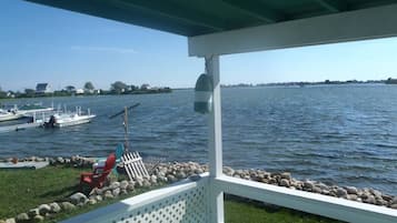 Enjoy serene views of the calm water from this tranquil outdoor space.