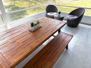 Outdoor dining - Boho Luxe Escape - Pet Friendly, Fire Pit, Grill, & Beach! (Palm Coast)