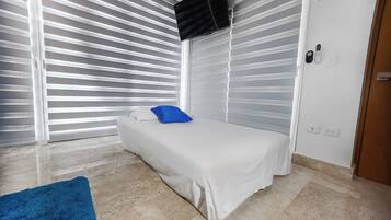 1 chambre, coffres-forts dans les chambres, fer et planche Ă repasser