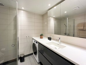 Shower, hair dryer, towels, soap