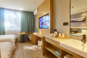 A hotel room with a bed, a desk, a TV, a bathroom with a sink and mirror, and a window with curtains. - Accompanying Hotel·Yipin (Shanghai Lujiazui Financial and Trade Zone) (Shanghai)