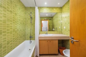 Hair dryer, bidet, towels, toilet paper