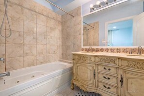 Jetted tub, hair dryer, towels, soap