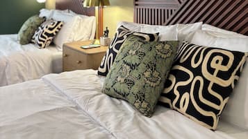 1 bedroom, desk, iron/ironing board, travel crib