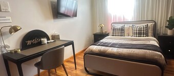 Amelia Suites Newark – Cozy stay with AC, Wi-Fi & NYC access!