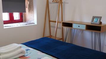 1 slaapkamer, een strijkplank/strijkijzer, wifi