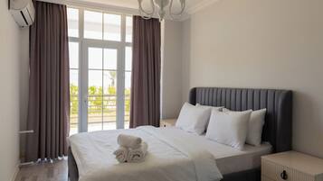 Egyptian cotton sheets, premium bedding, desk, laptop workspace