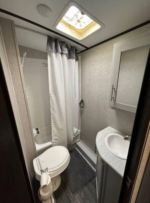Hair dryer, towels, soap, toilet paper