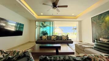 Departamento familiar, vista a la playa | Sala de estar