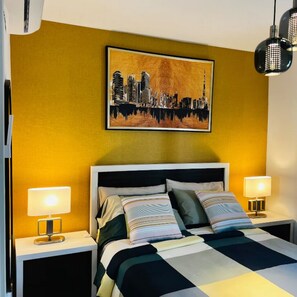 1 habitación, tabla de planchar con plancha, wifi y ropa de cama 