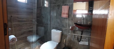 Shower, towels, soap, toilet paper